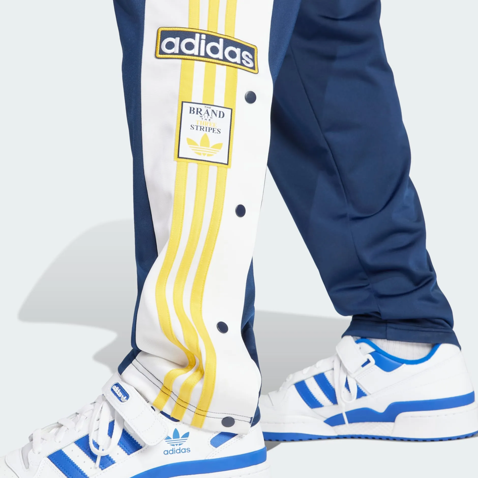 ADICOLOR CLASSICS ADIBREAK TRACKSUIT BOTTOMS - Night Indigo / Bold Gold / White